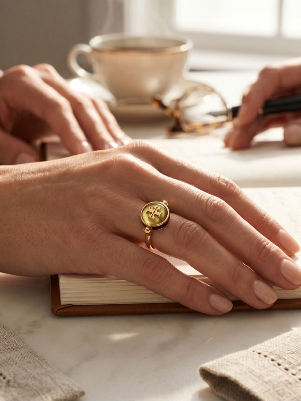 Tory Burch Kia Semiprecious Rotational Gold Ring with Light Green Logo Center - Picture 2 of 4